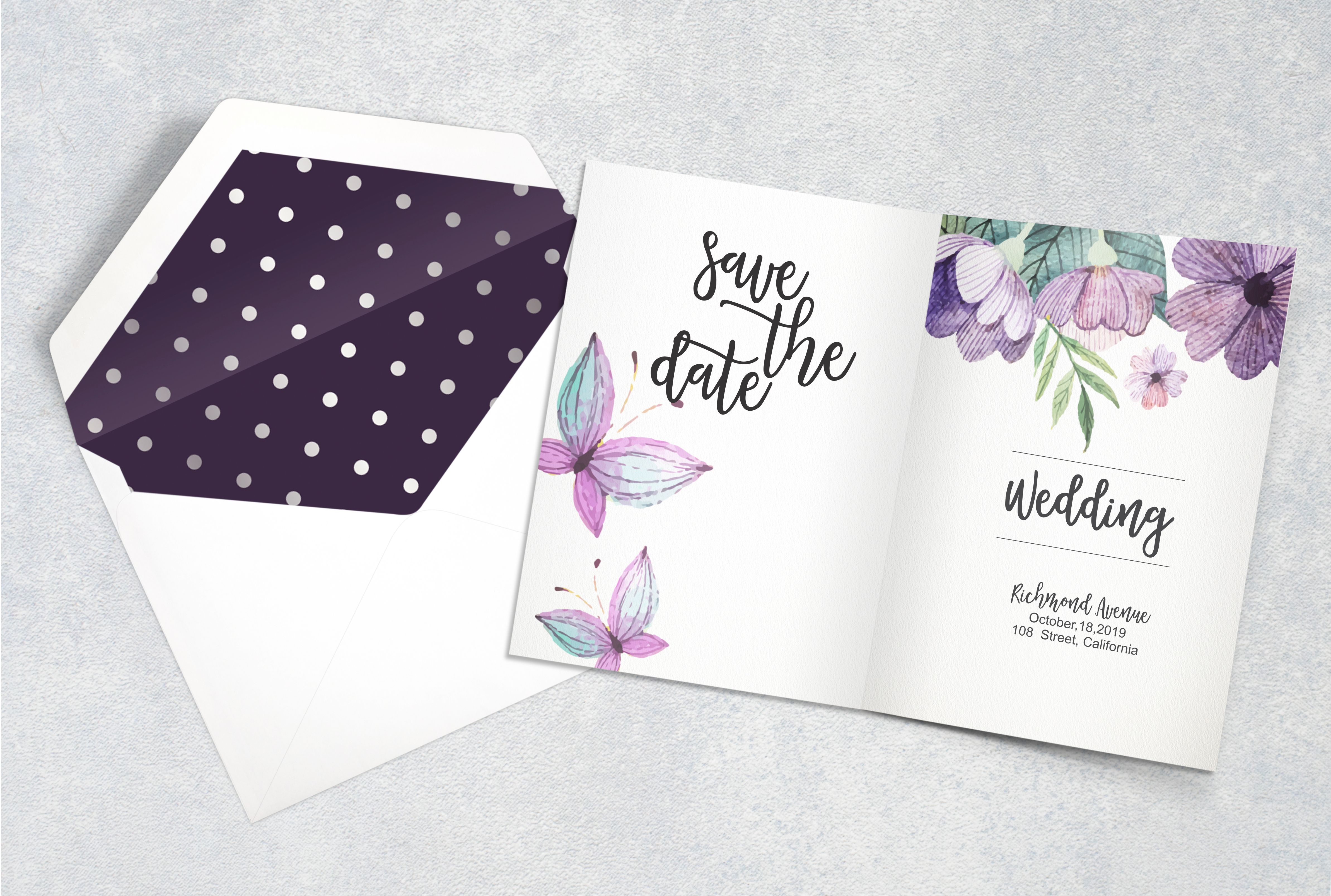 Delicate floral wedding invitation in purple.