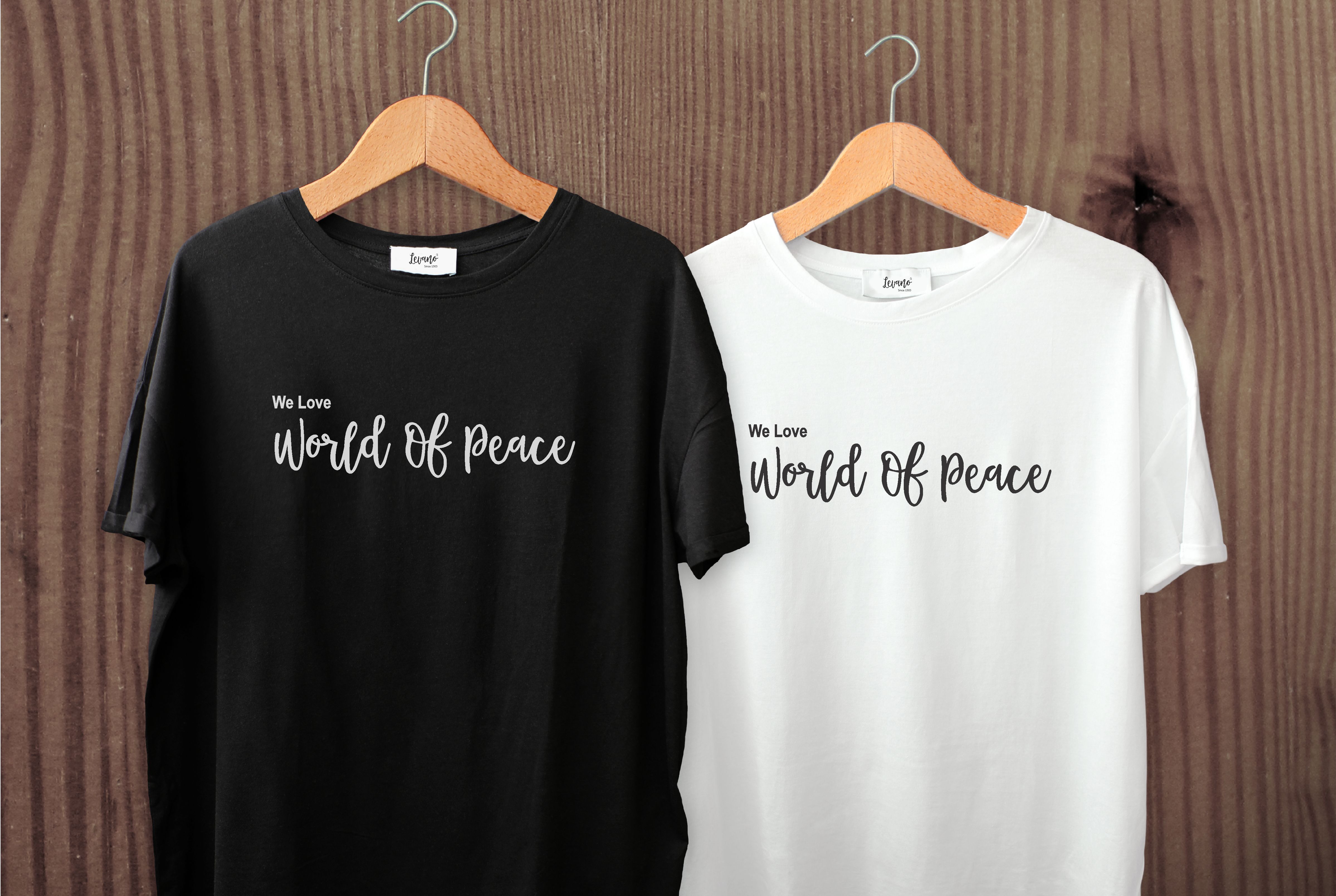 Two t-shirts with simple lettering.