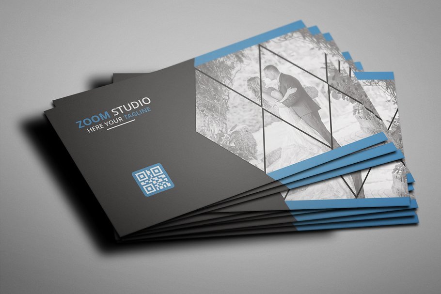 Black matte cards with blue geometric shapes and photography.