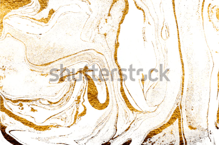 Marble white background with golden blotchiness and veins.