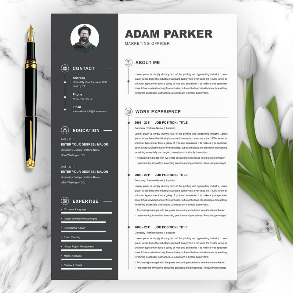 Black and white resume on a marble table.