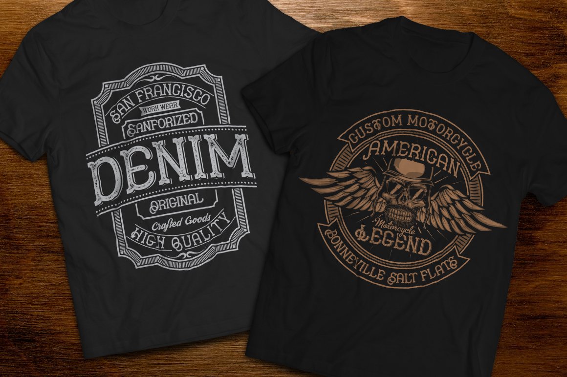 Two dark T-shirts with wings and vintage lettering.