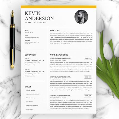 White and yellow resume on a marble table.
