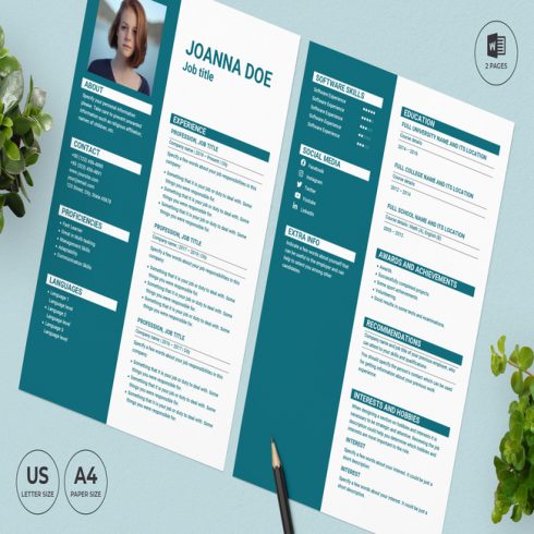 Green and white resume template on a table.
