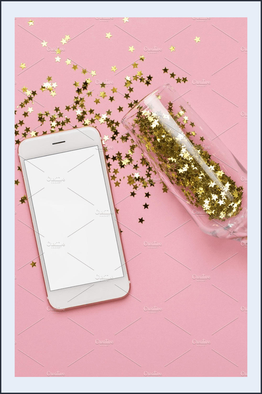 Pink background with mobile phone and champagne glasses