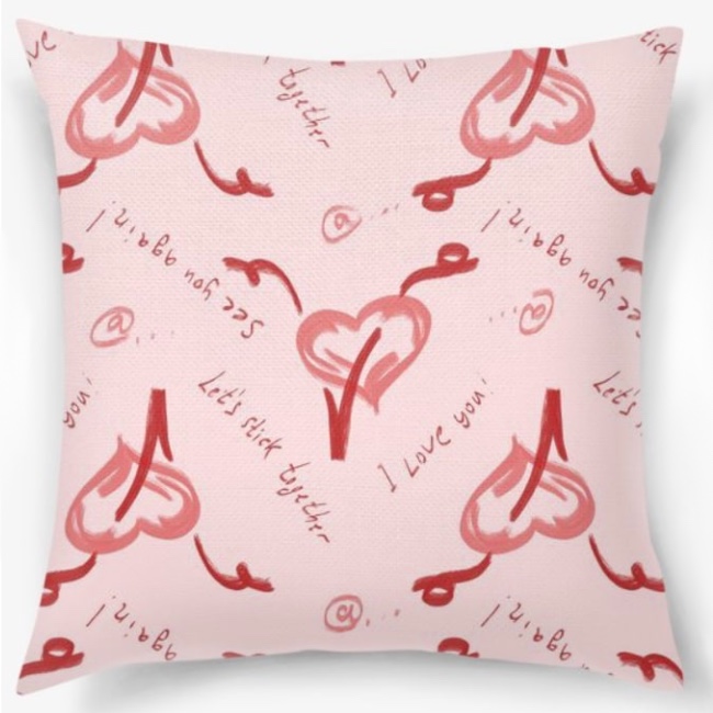Pink pillow with hearts.