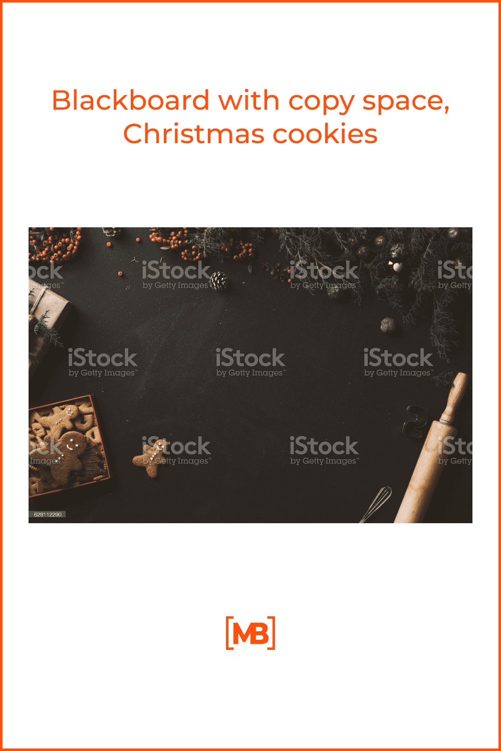 box with gingerbread cookies, branches of a Christmas tree, rolling pin on a black background.