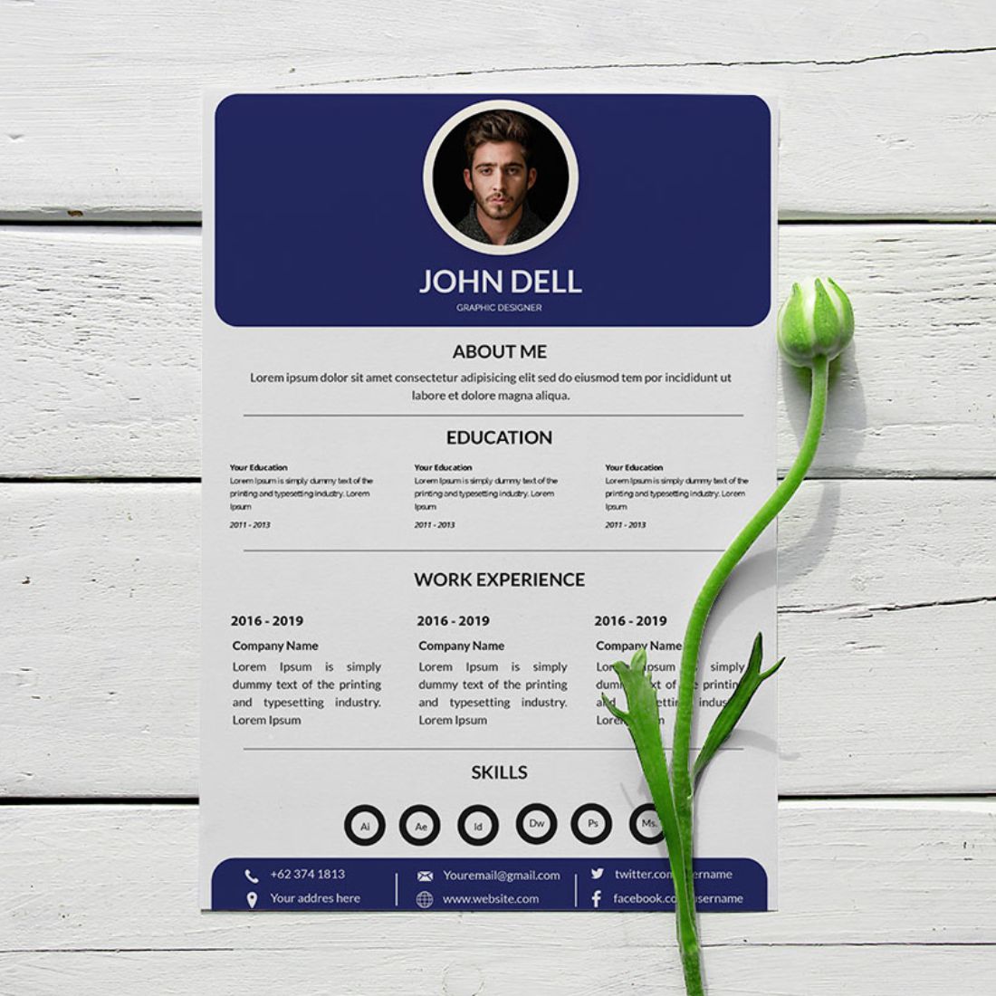 Blue and white resume with a single flower.