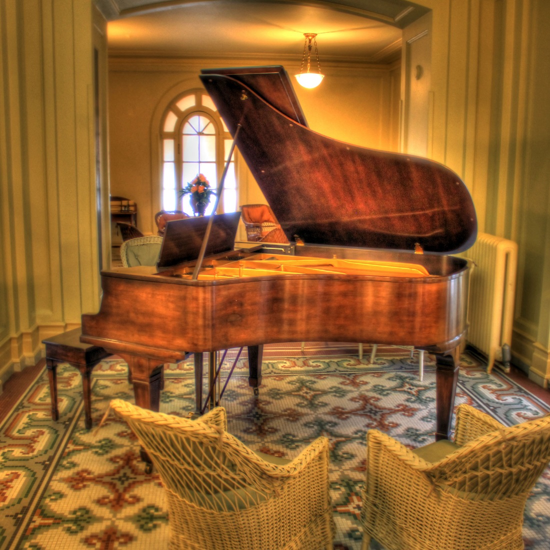 Exclusive piano in parlor room.