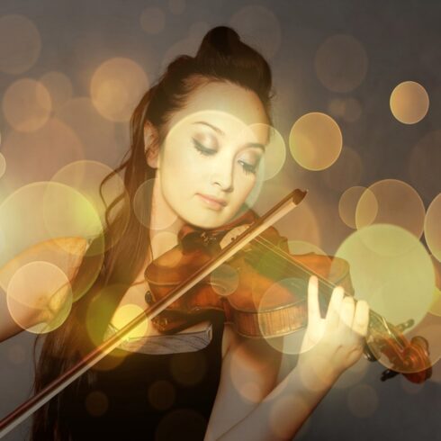 violin player with light sparkles square