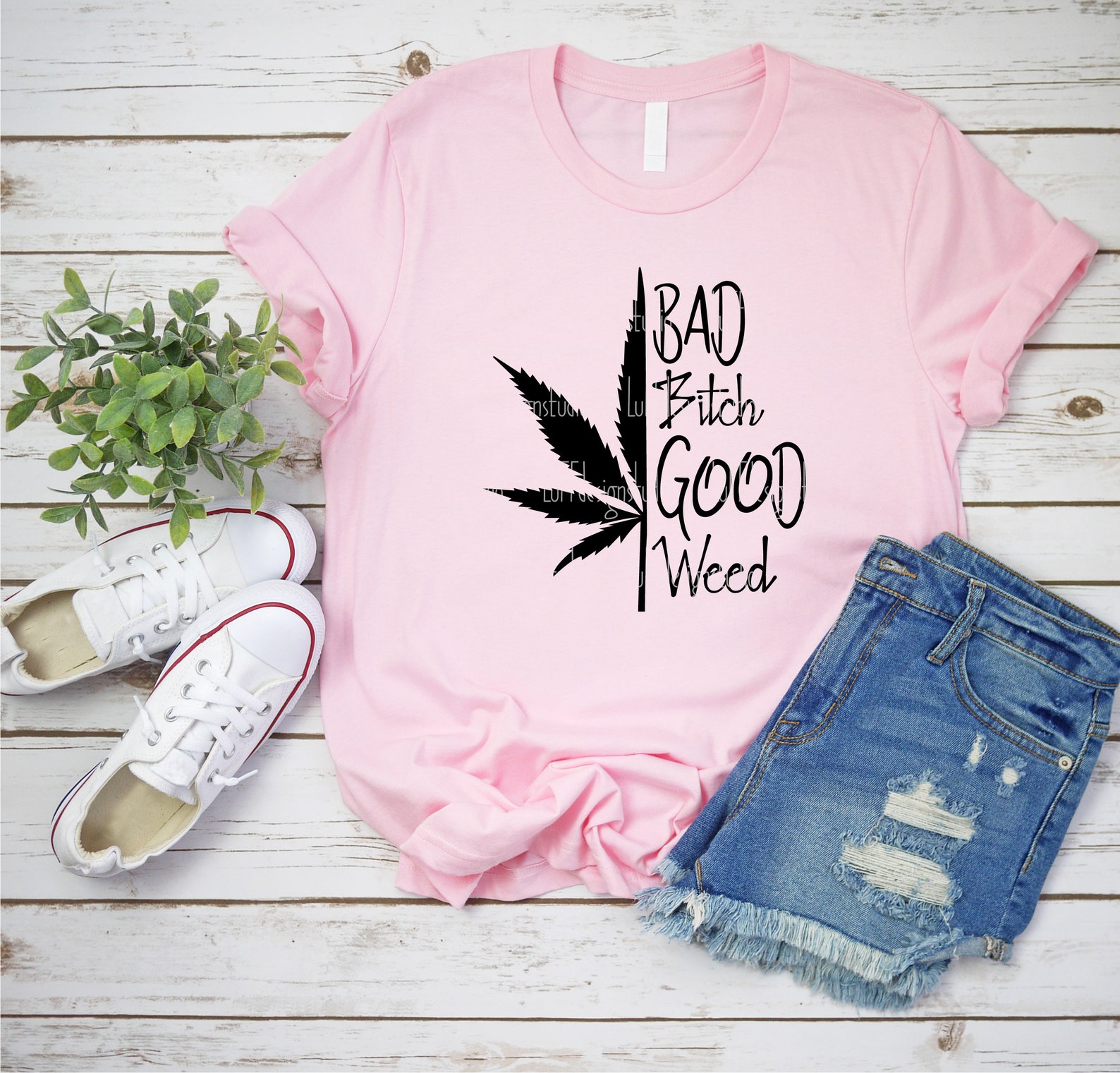 Pink t-shirt with the weed print.