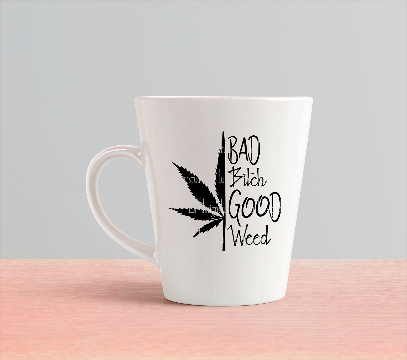 White cup with weed.