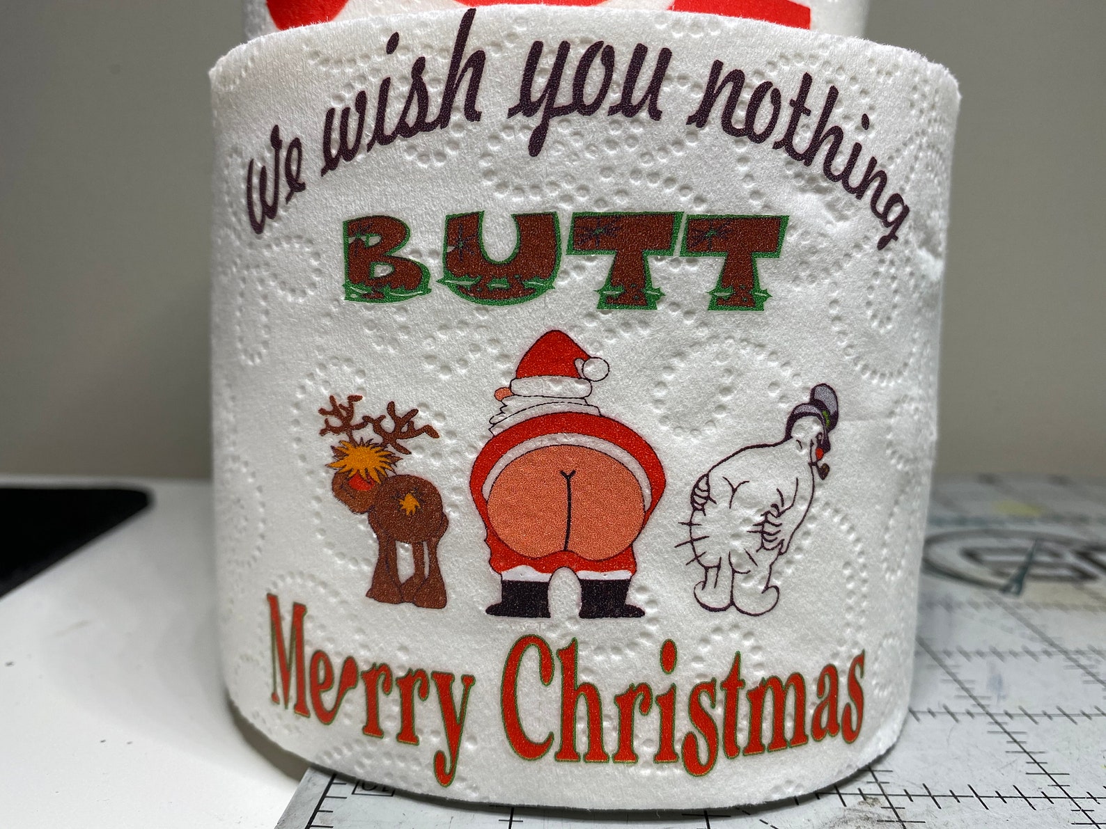 Toilet paper with Santa's ass.