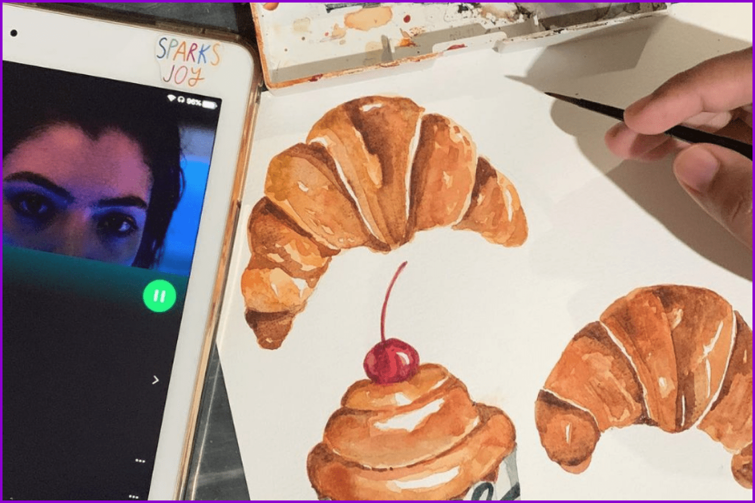 Drawn croissants on a sheet of white paper.