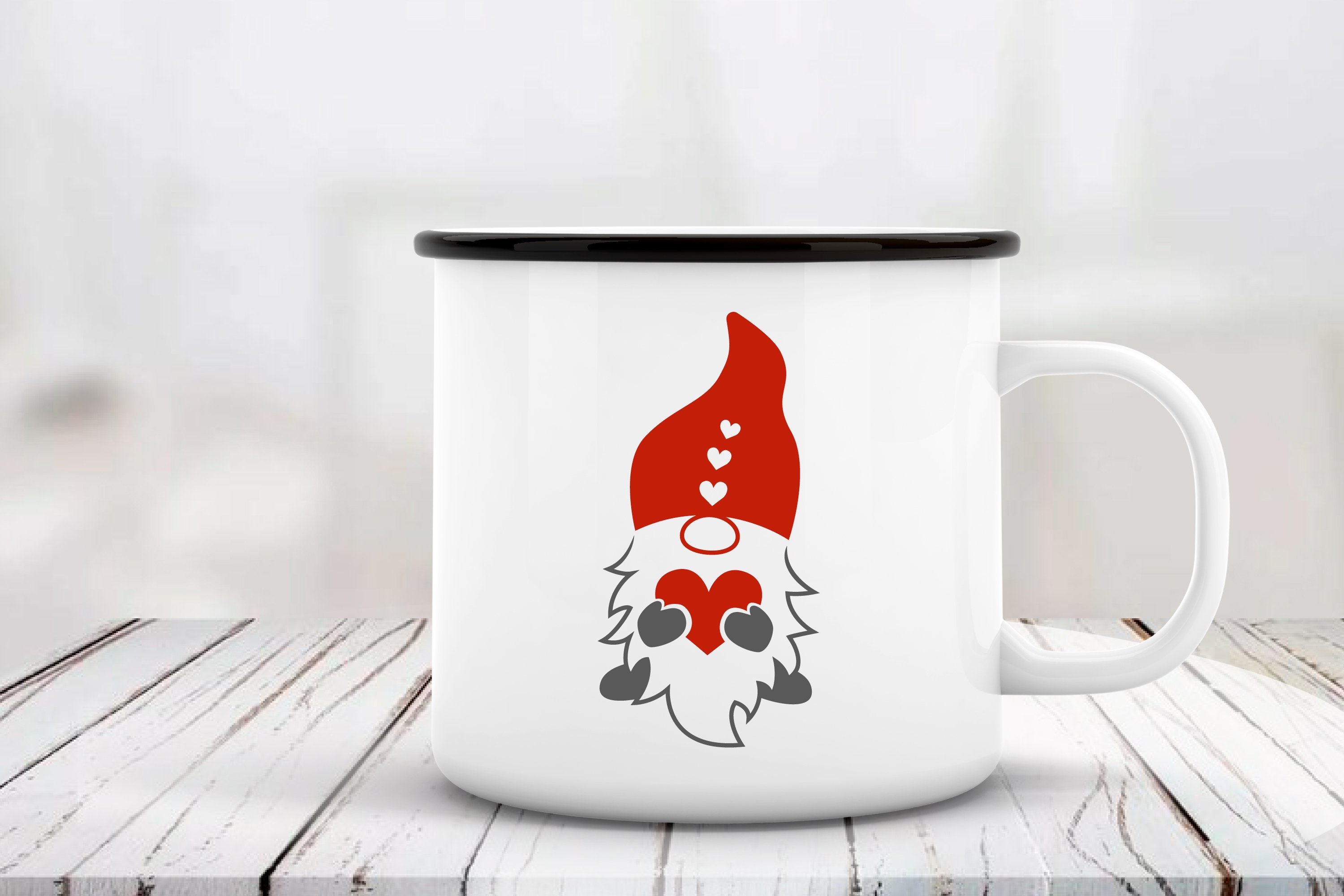 White cup with gnome in red.