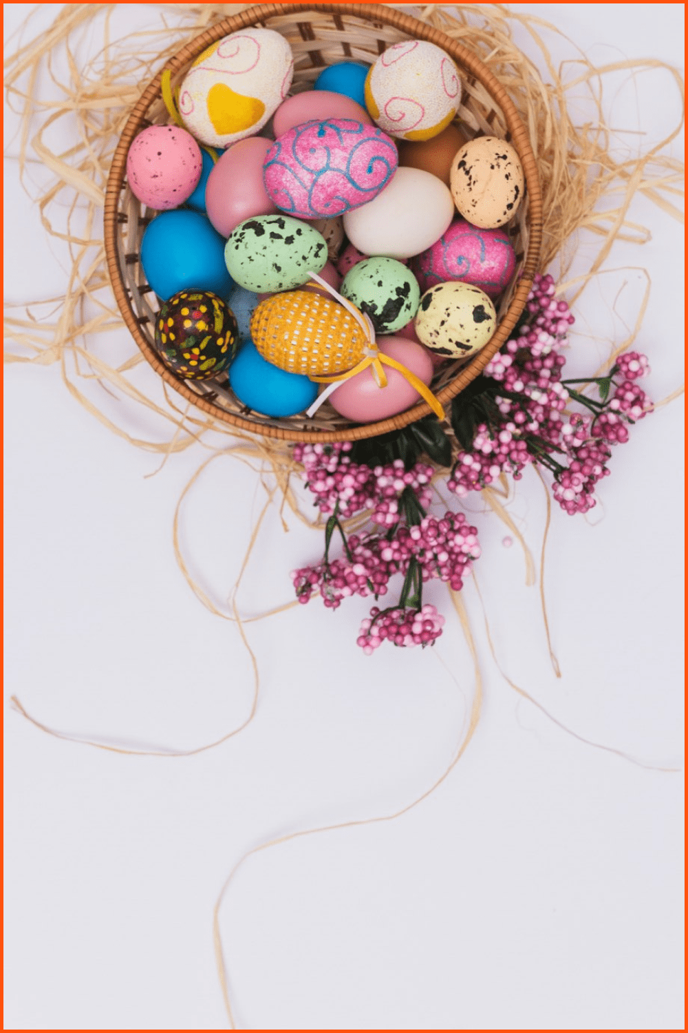 Bowl with eggs straw flowers.