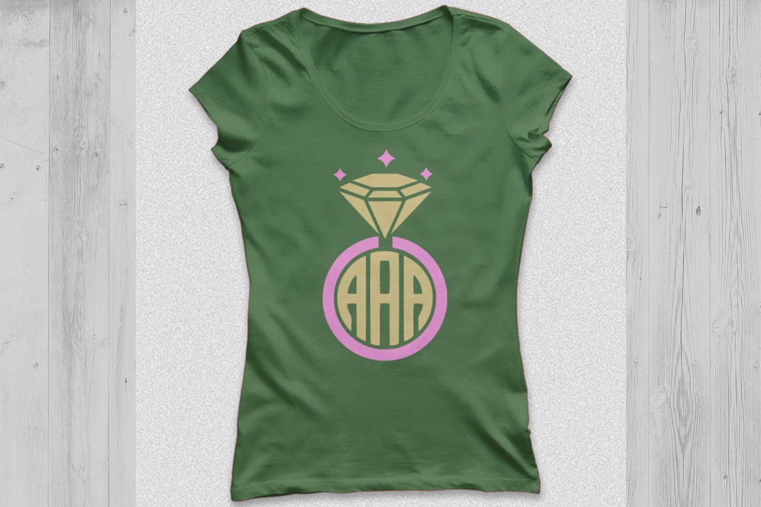 Green t-shirt with ring illustration.