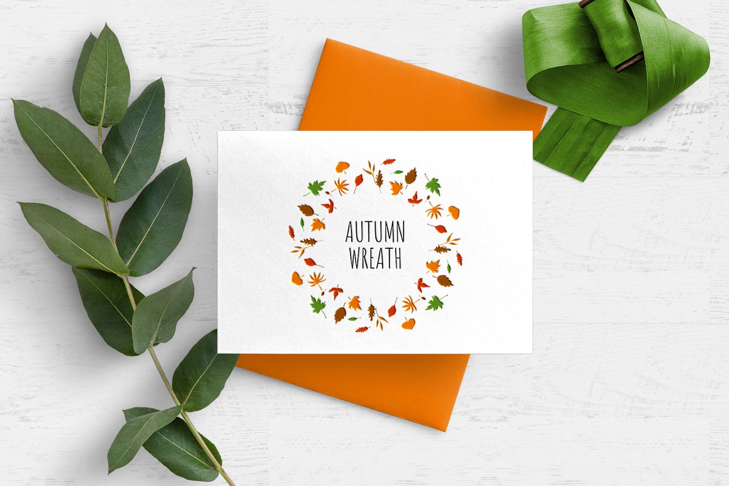 Colorful autumn wreath on the postcard.