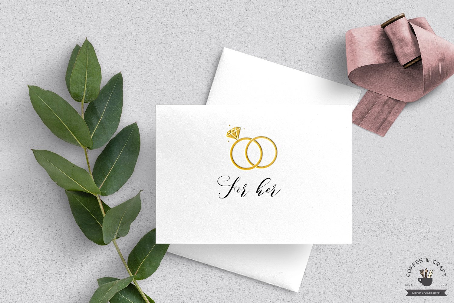 Wedding cards with gold rings.
