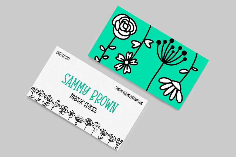 Bloomdings: Abstract Floral Dingbats - Mockup on Business Card.