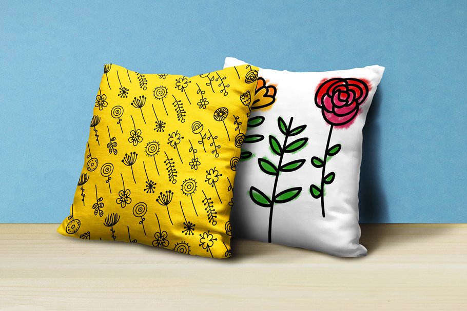 Bloomdings: Abstract Floral Dingbats on the pillows.