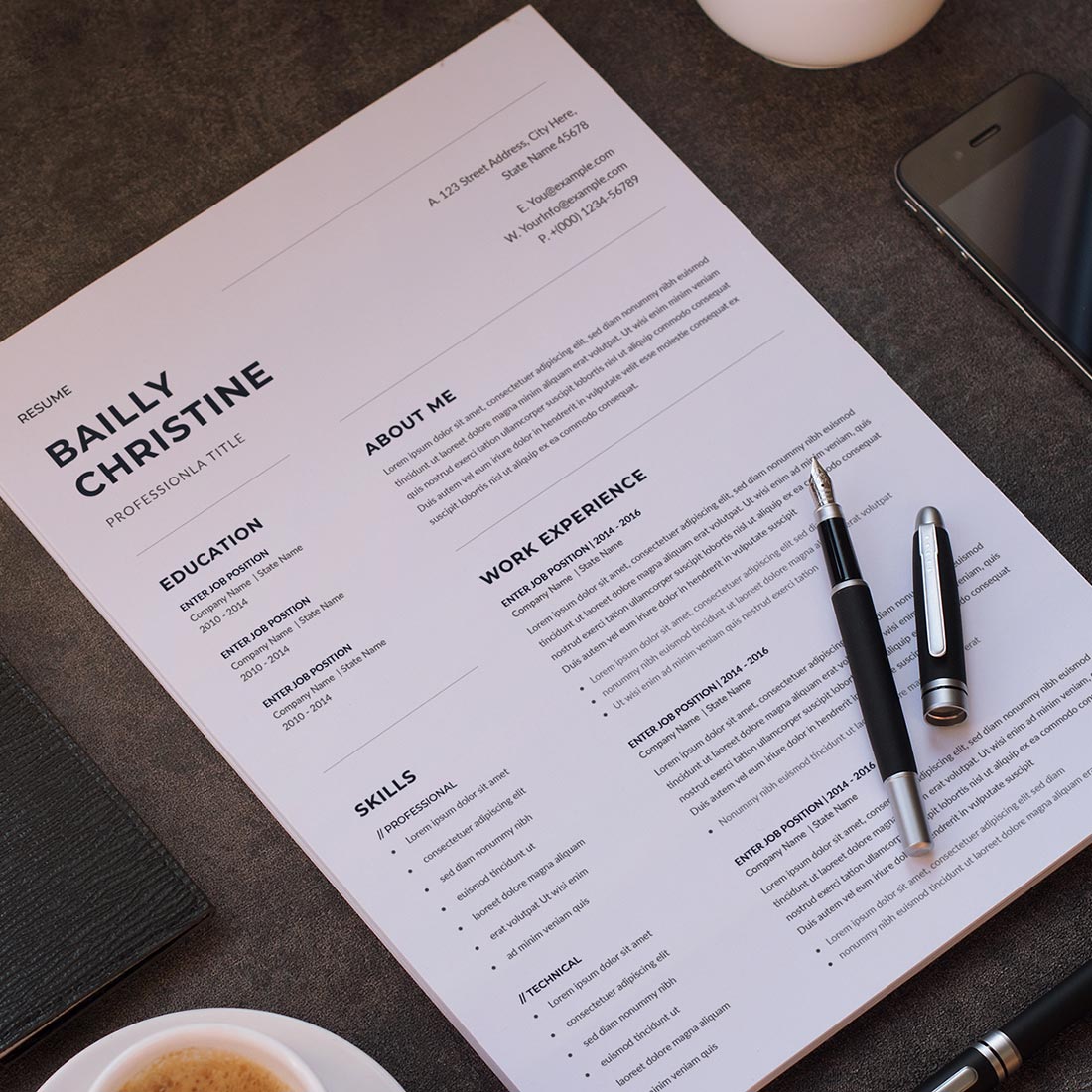 Cup of coffee and a menu on a table.