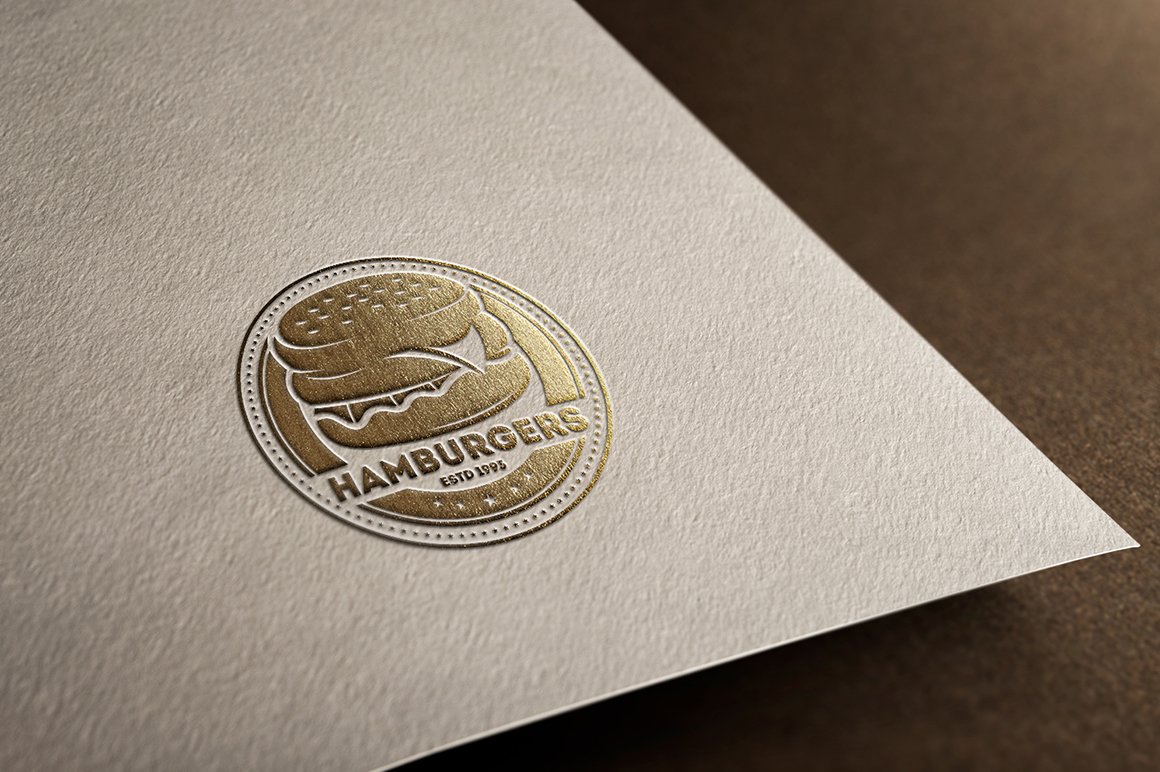 Beige paper with gold logo.