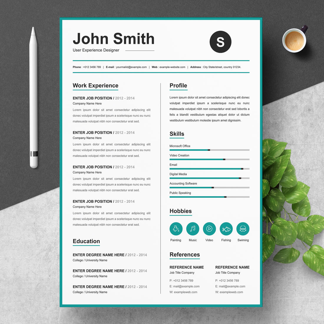 Green and white resume on a table next to a cup of coffee.