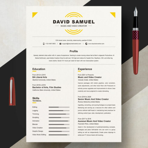 Professional resume with a red pen on top of it.