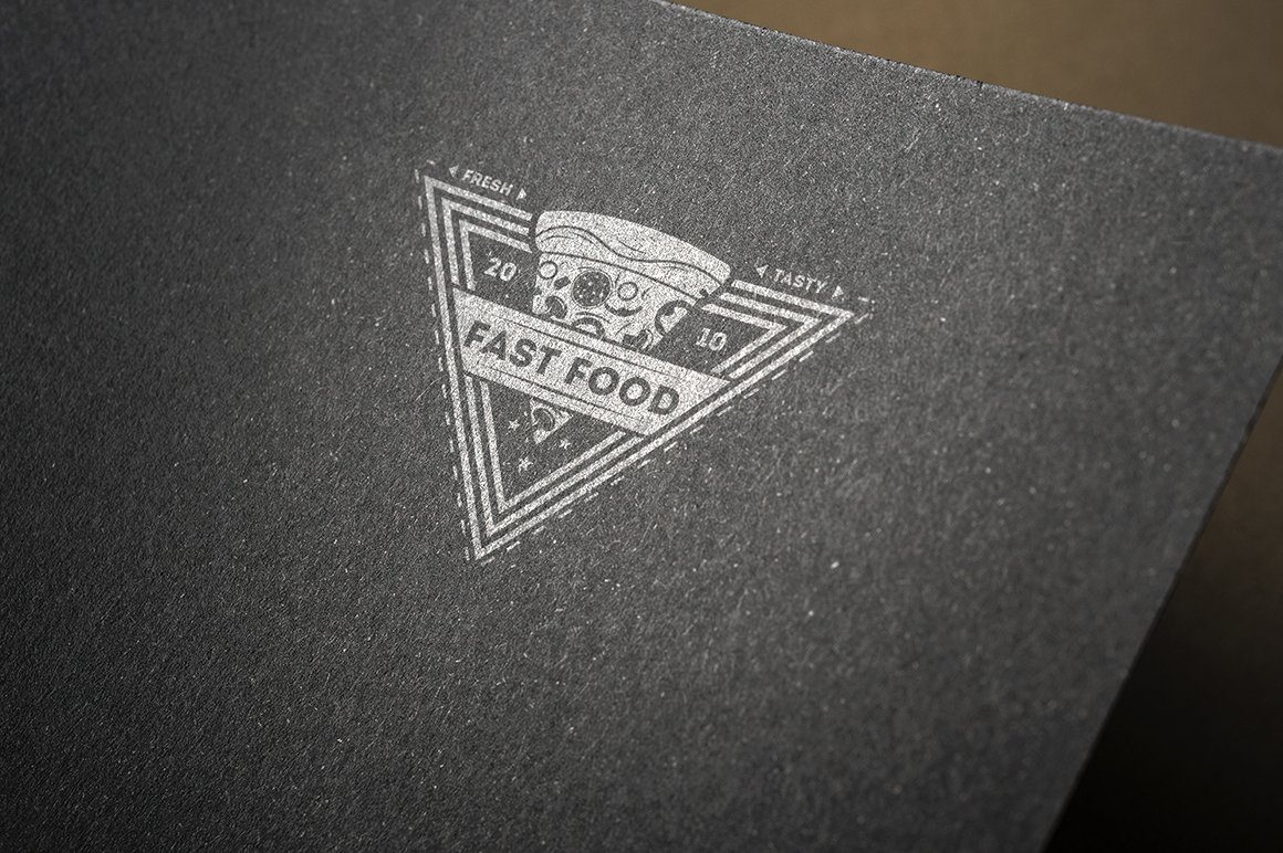 Matt dark grey paper with triangle logo.