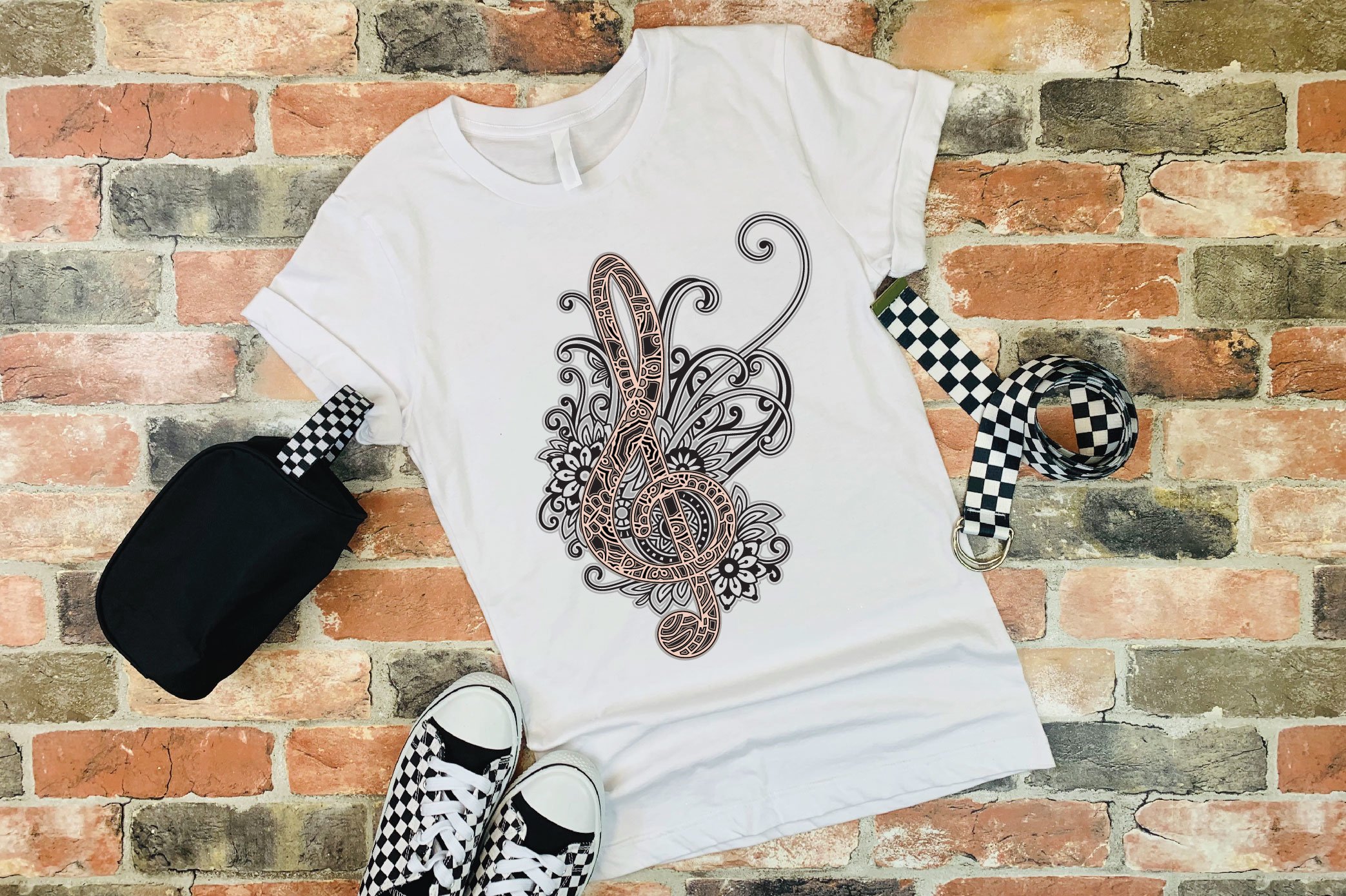 White t-shirt with music note illustration.