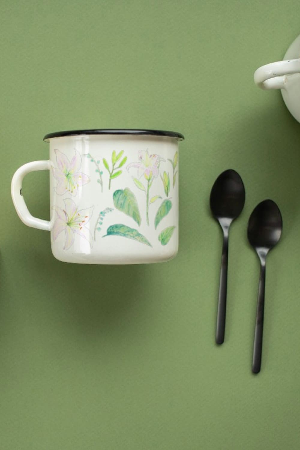 Cup with beautiful lilies.