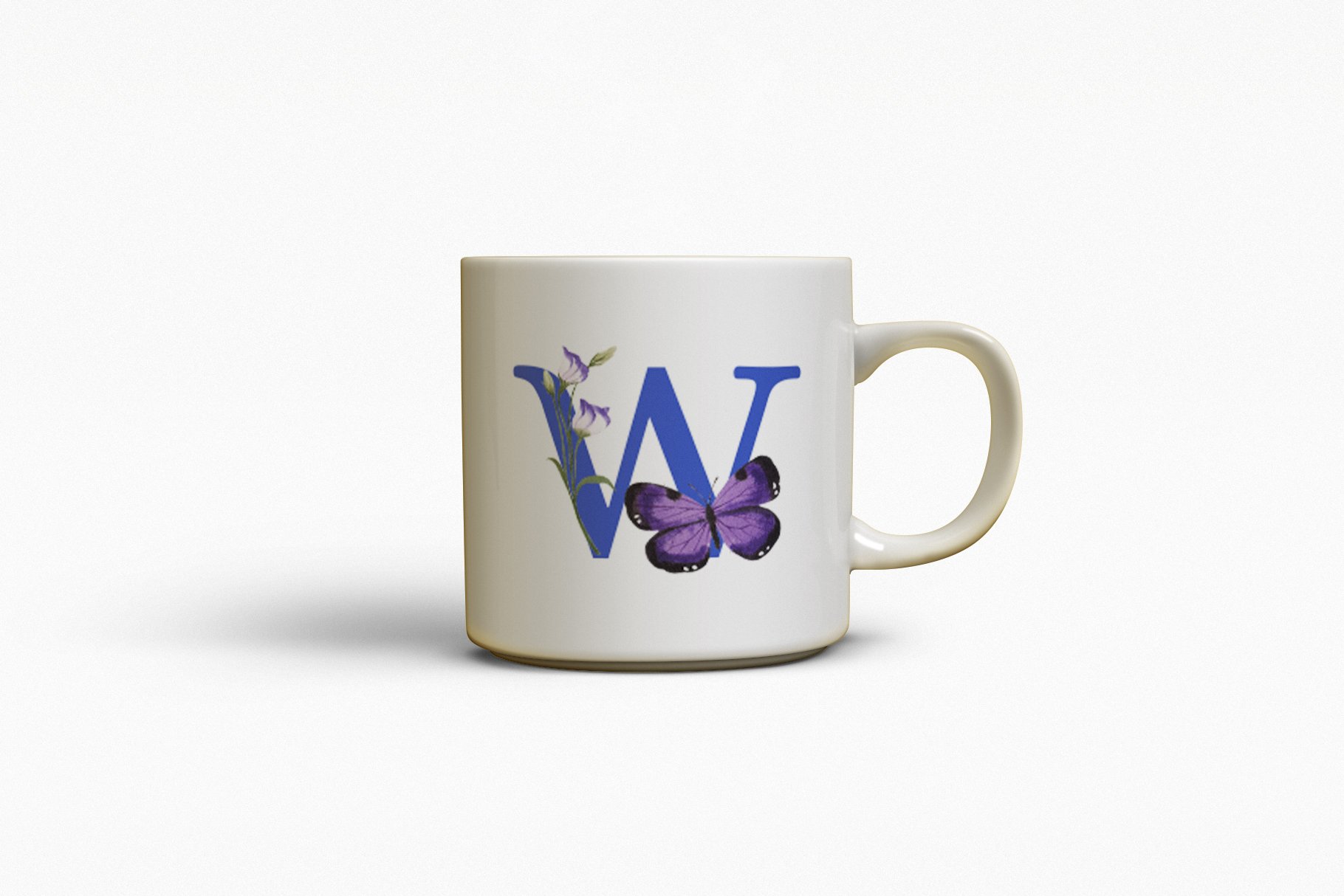 White cup with the purple blue butterfly.