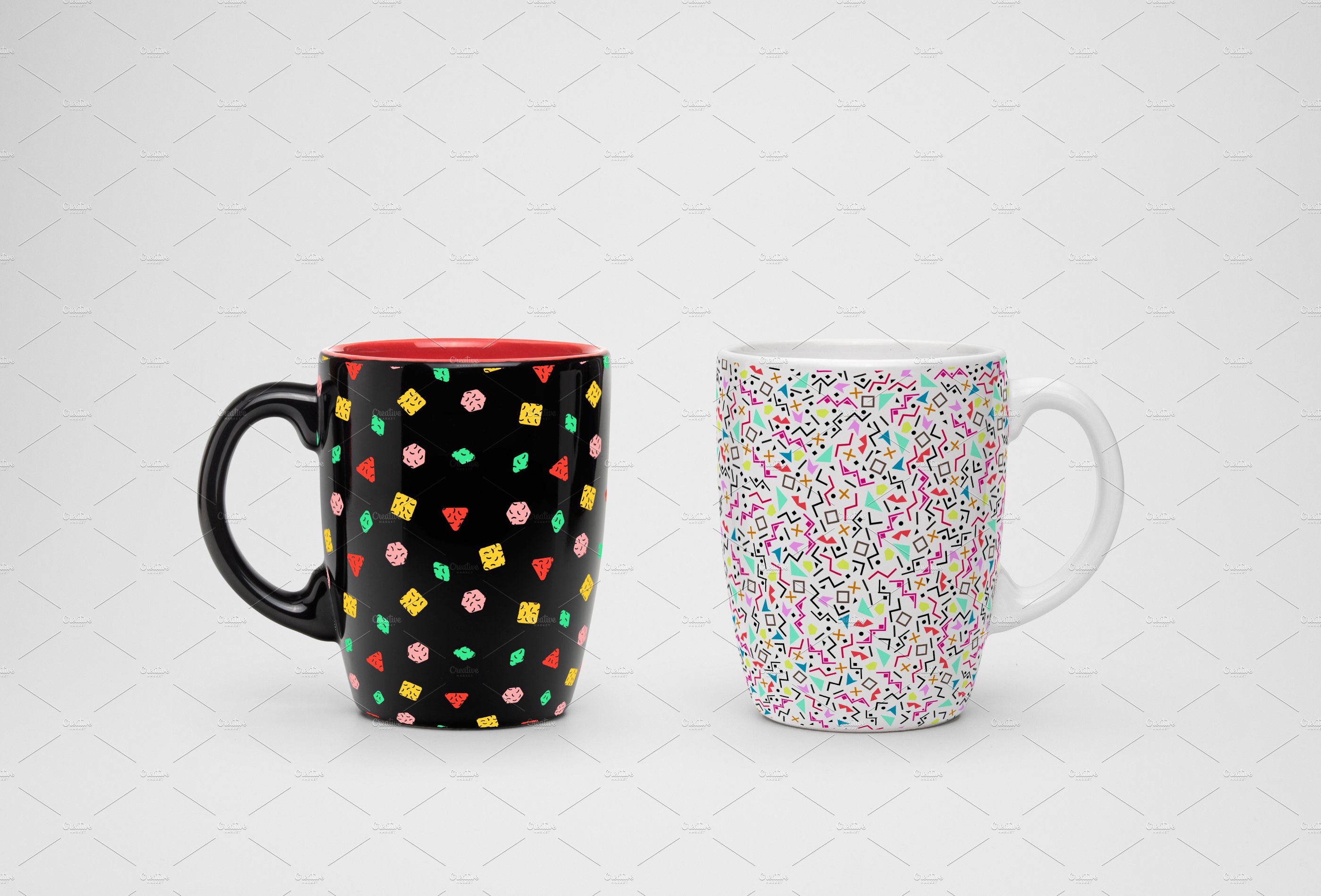 Two cups with geometric shapes.