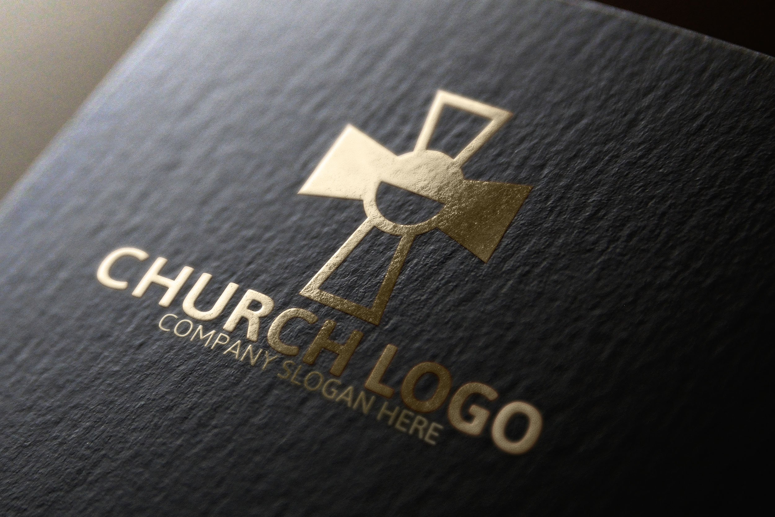 Leather background with a gold cross logo.