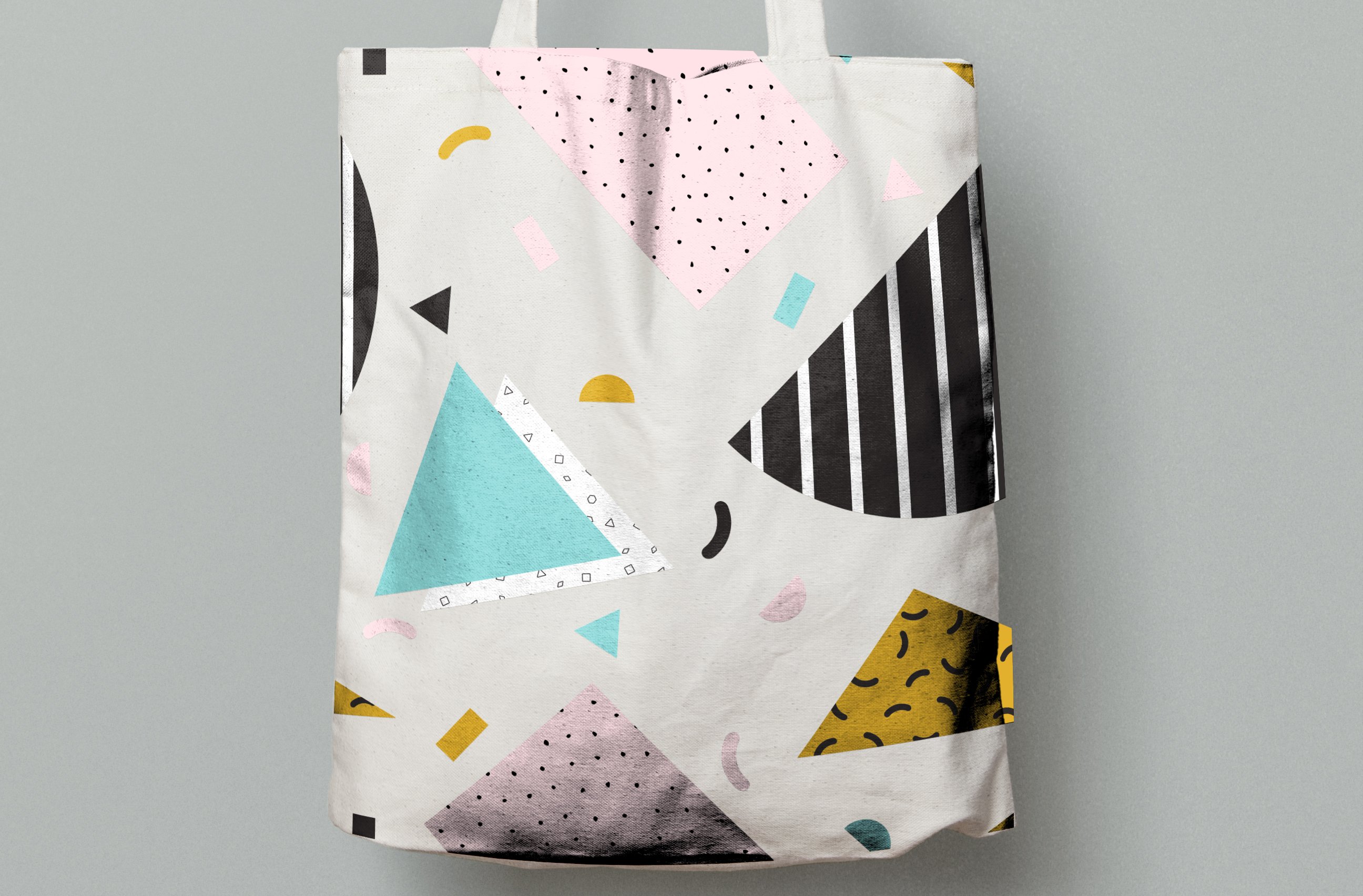 Big eco bag with laconic and colorful geometric shapes.