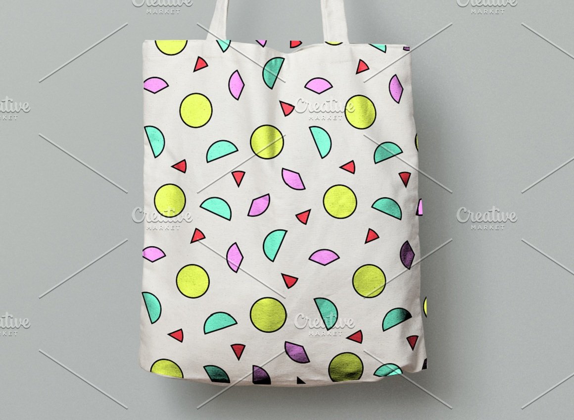 Stylish eco bag with colorful geometric shapes.