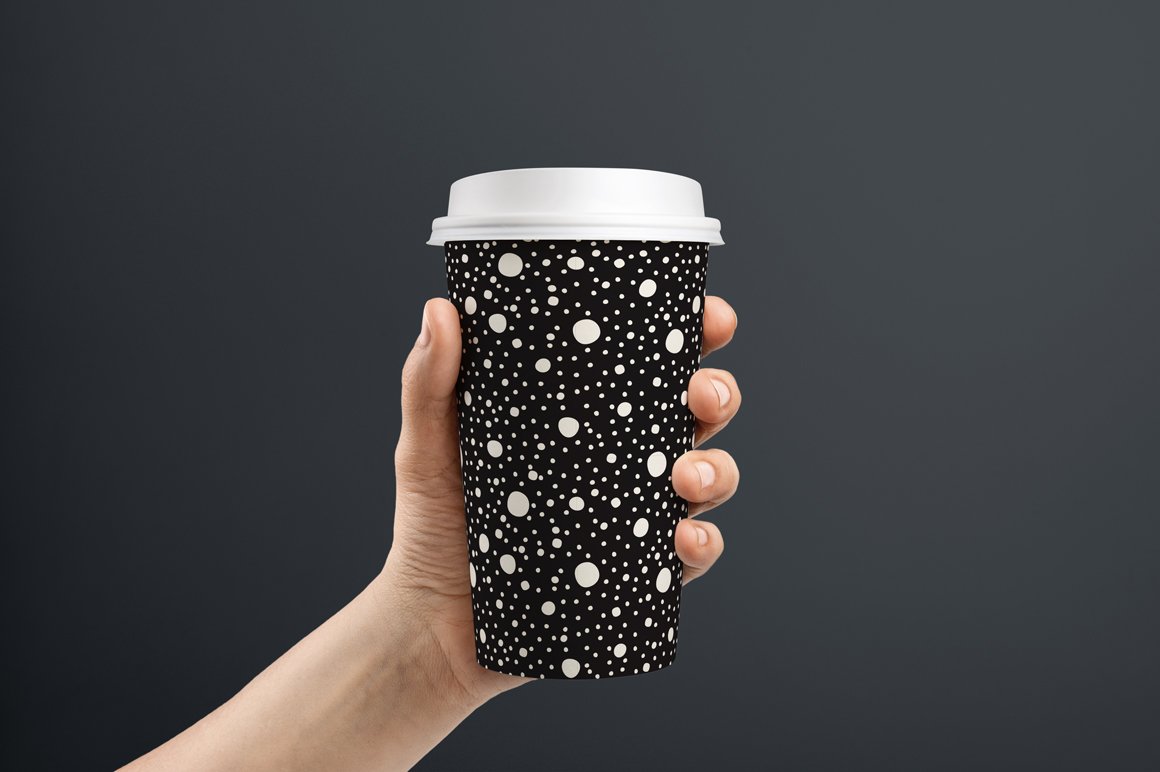 Black cup with the white drops.