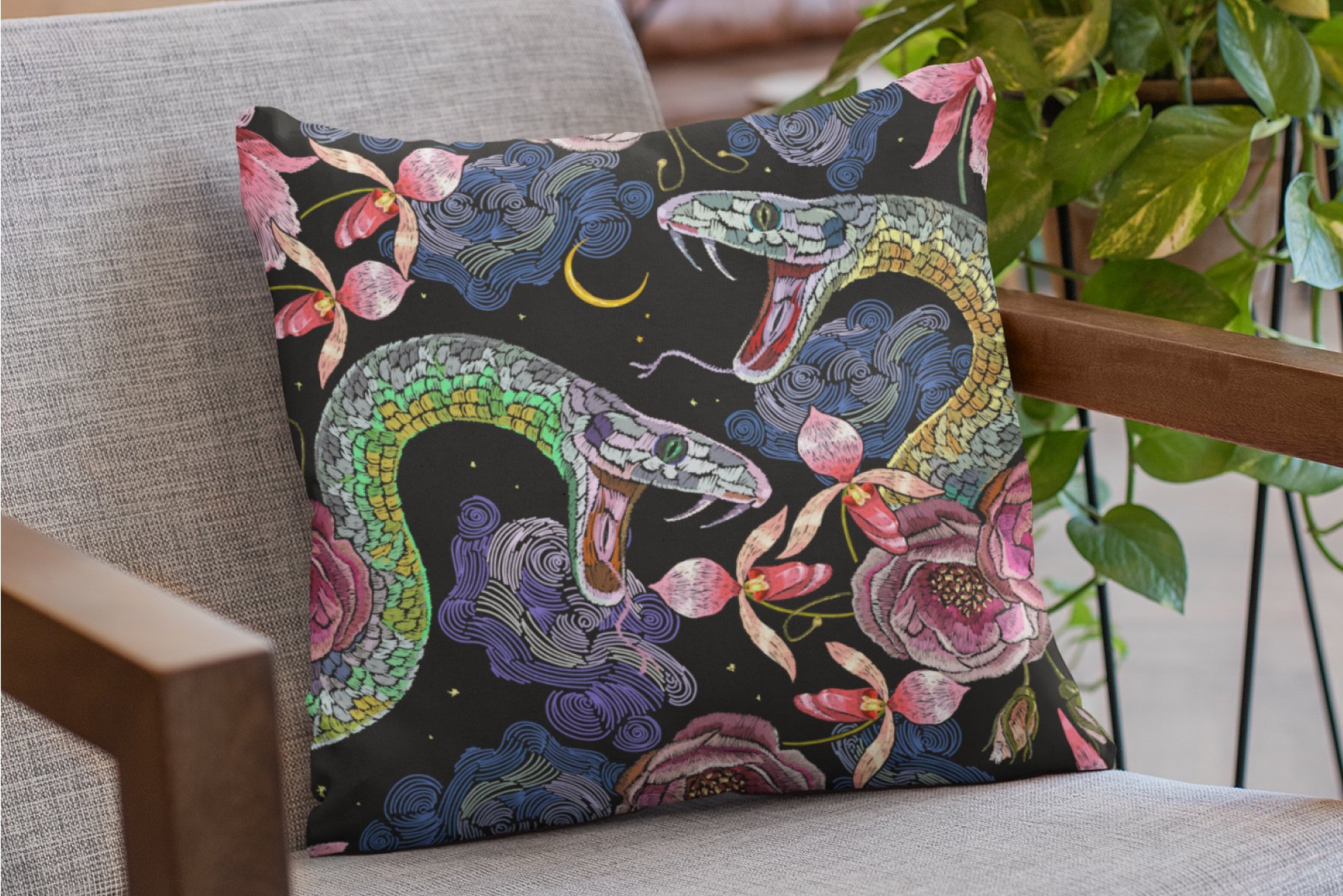 Matte snake illustration on a pillow.