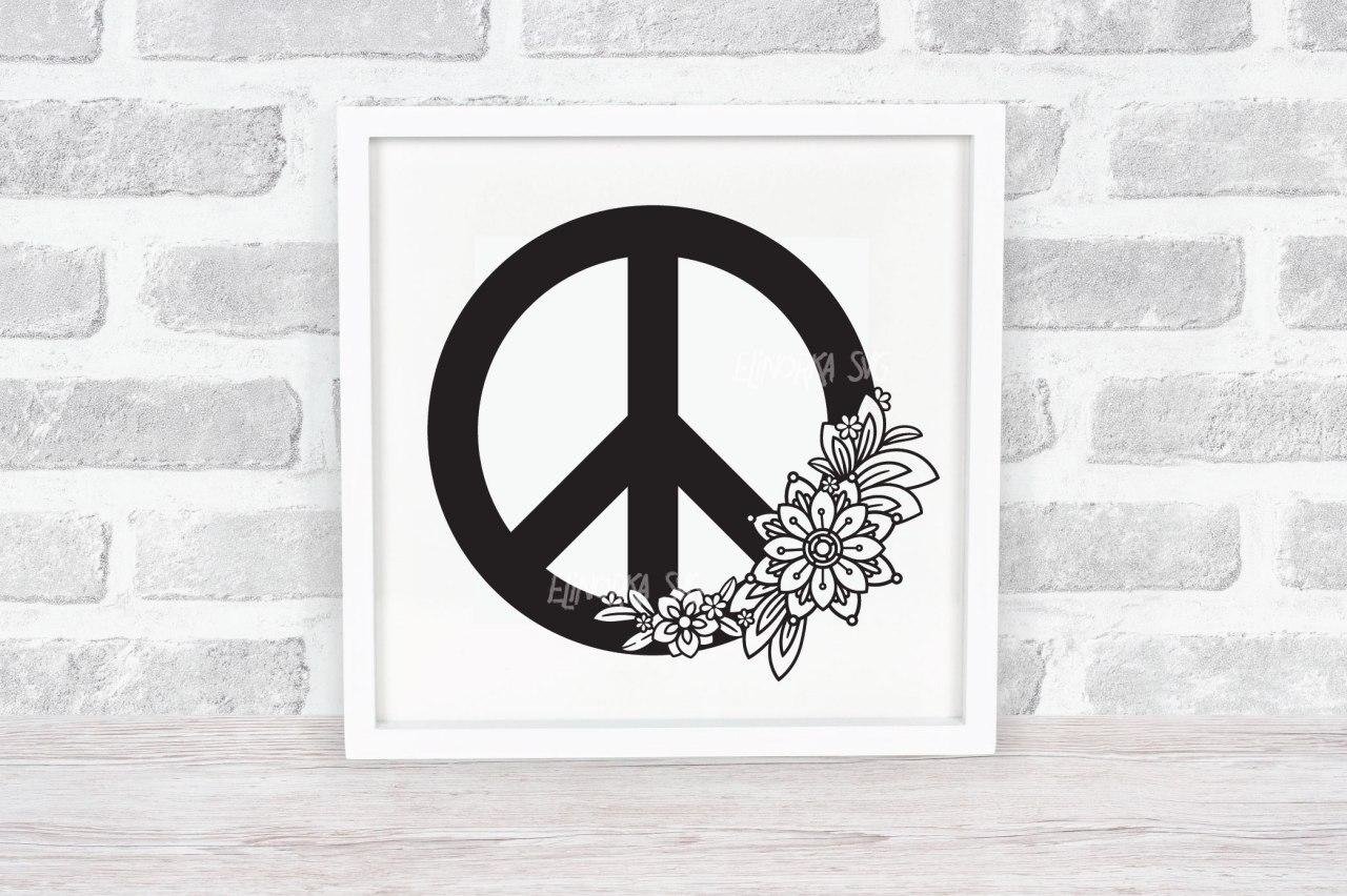 Black peace symbol with floral on a poster.