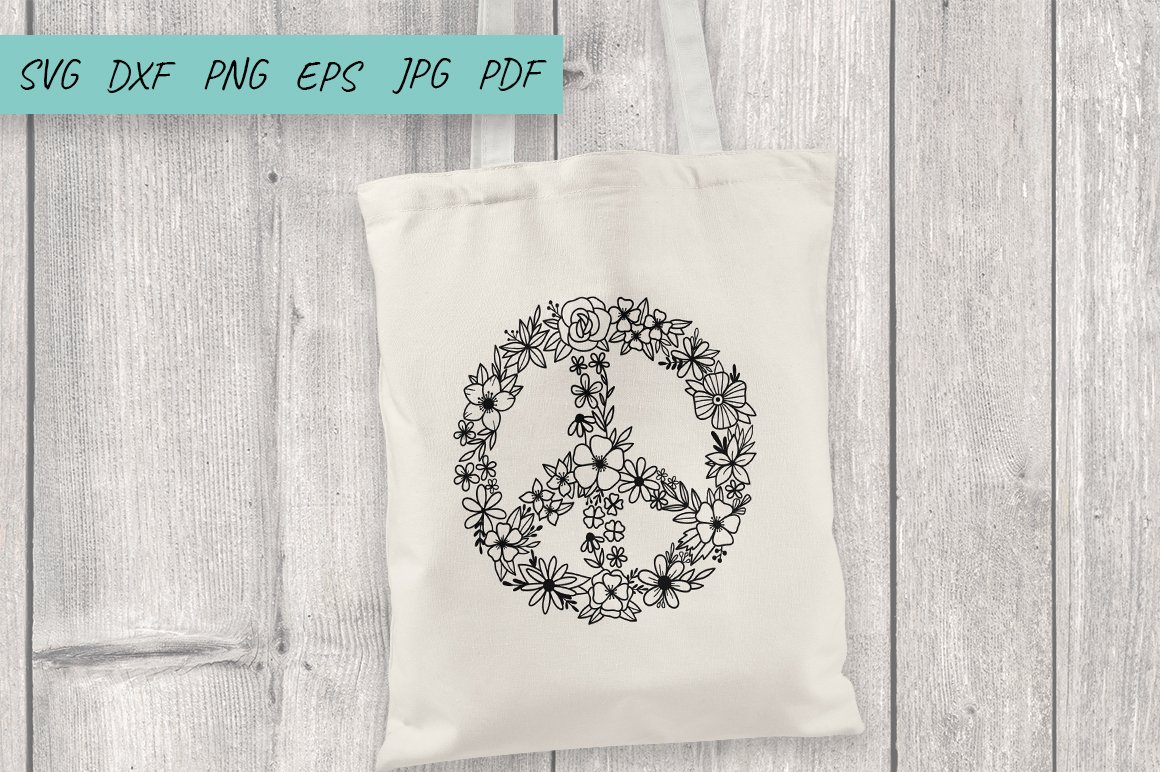 A circle of dark small flowers on a white eco bag.