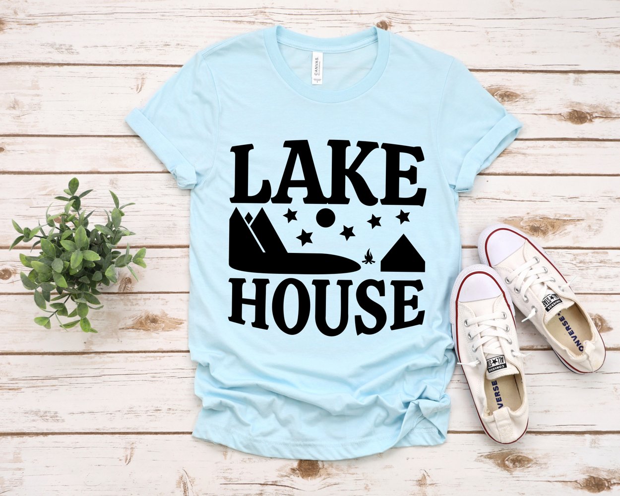 T-shirt image with house on the lake.