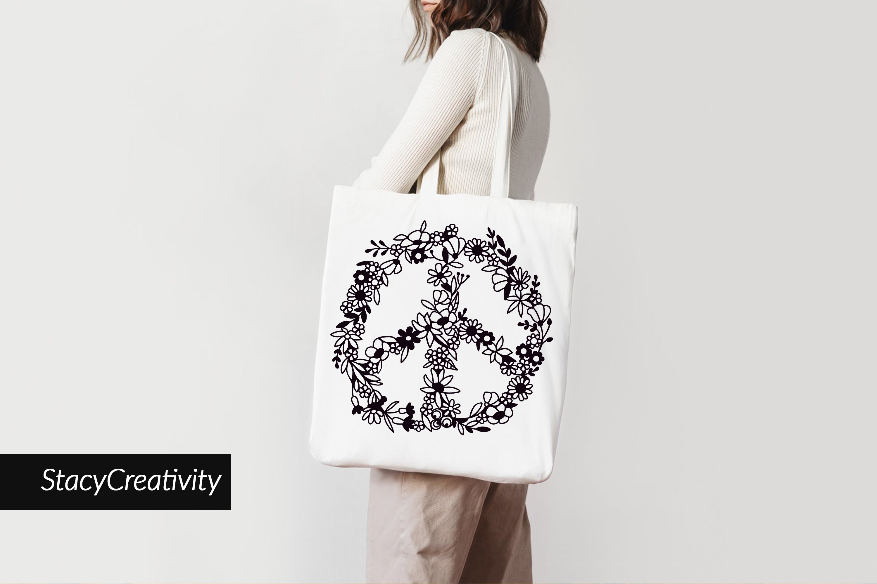 White eco bag with delicate floral peace sign.