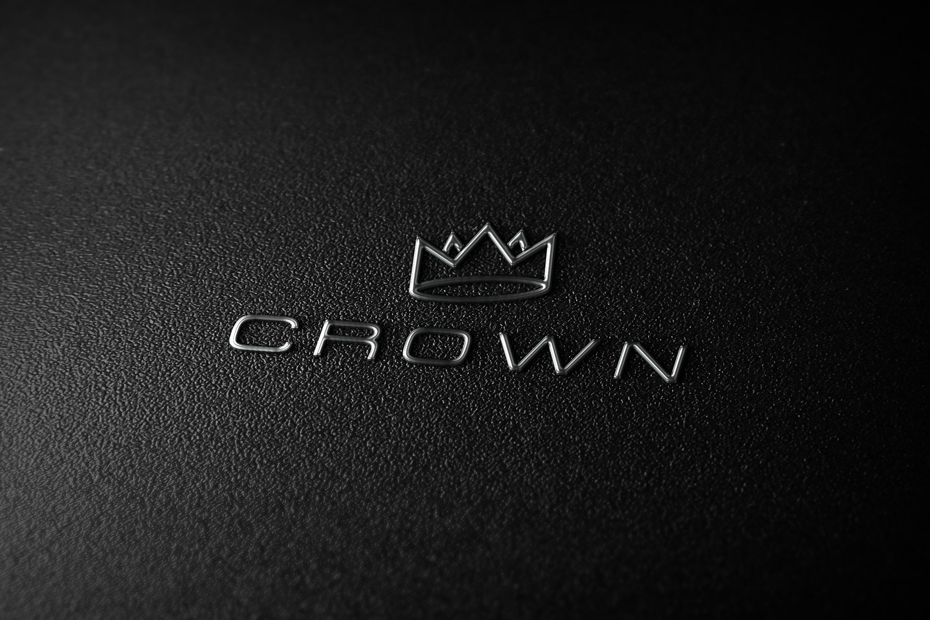 Matte black background with a gold crown logo.