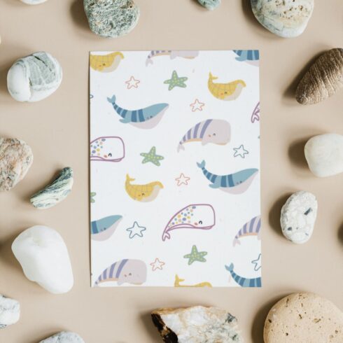Cheerful whales, dreamy starfish and fresh seaweed is drawn in a unique style.