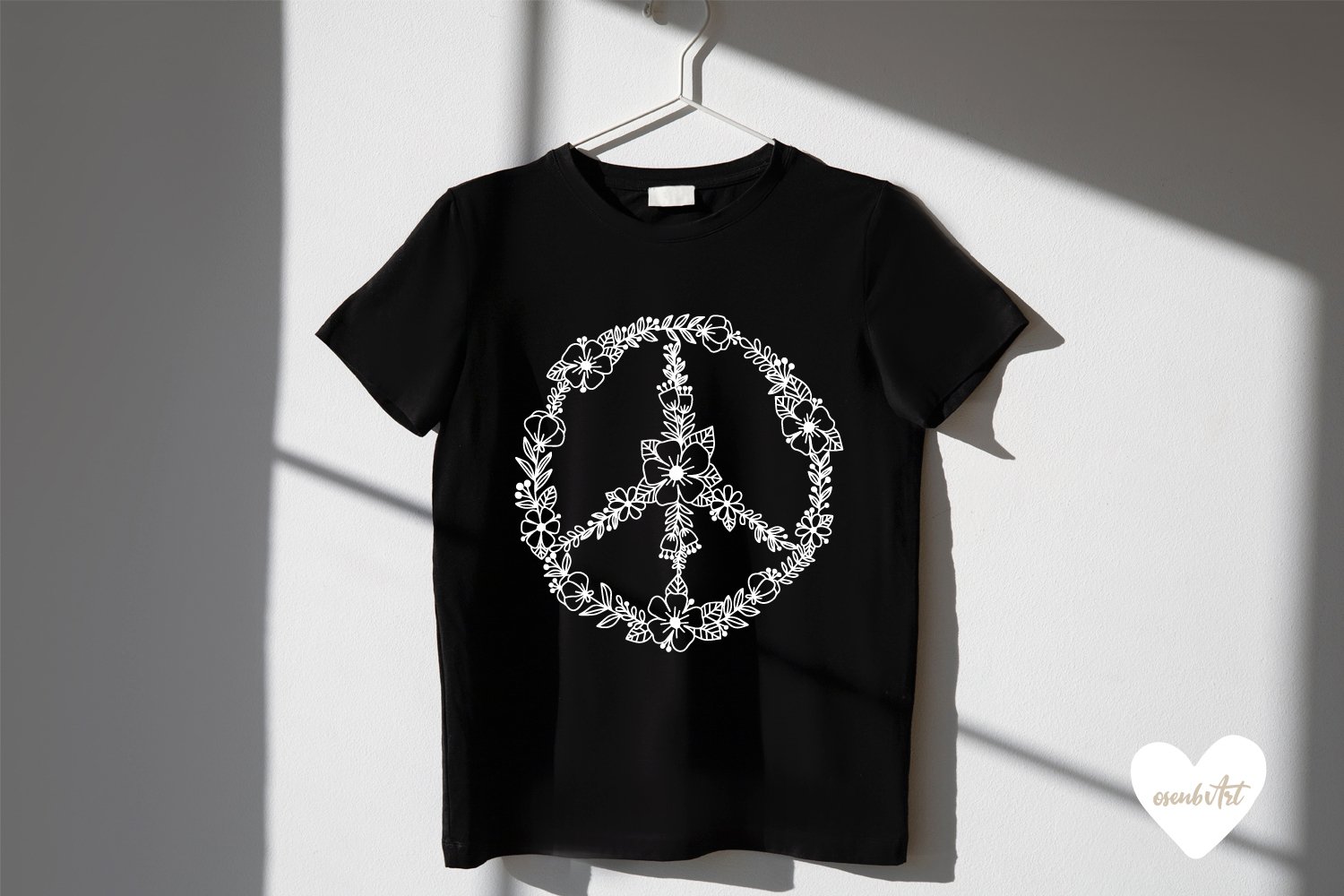 Black t-shirt with a white peace sign.