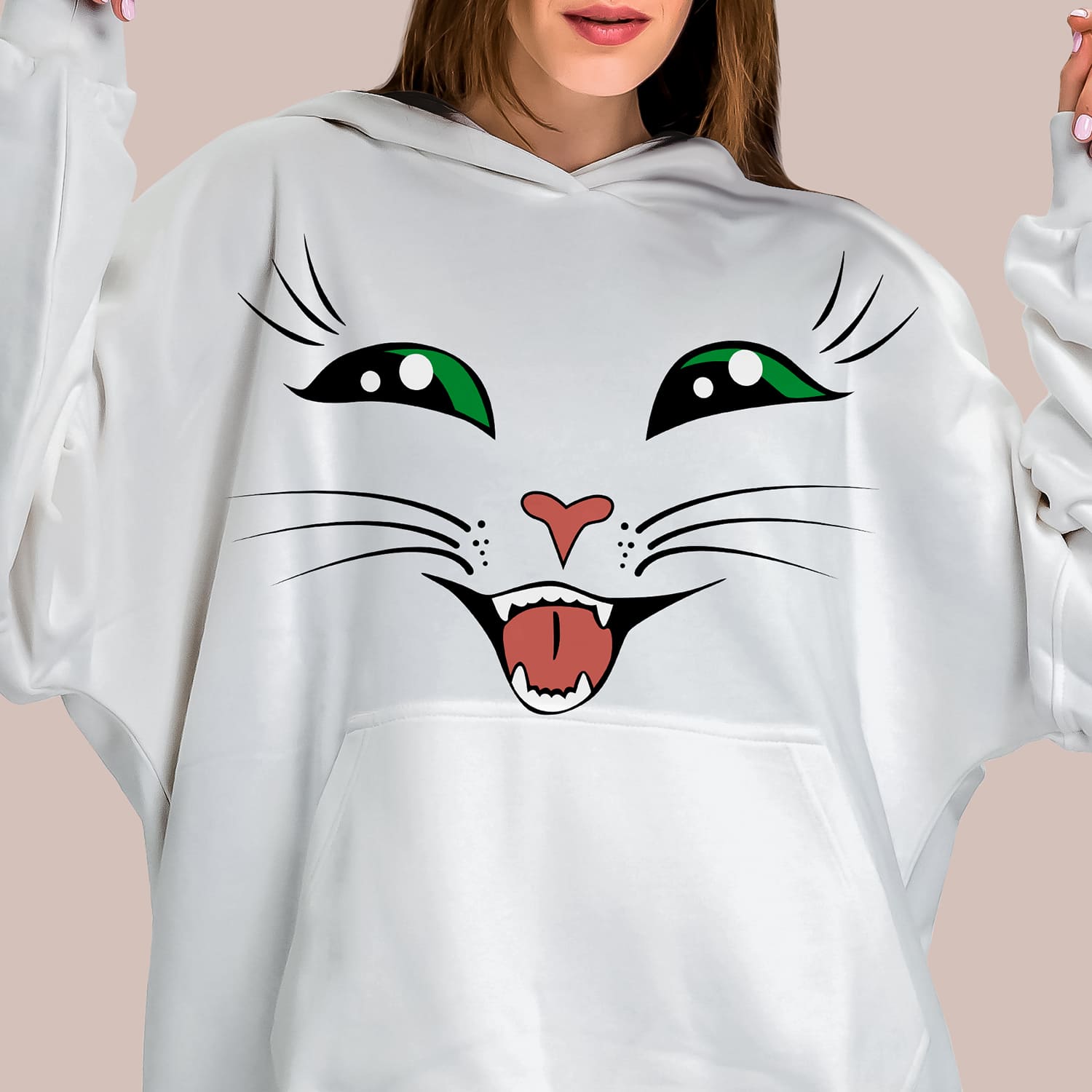 Woman wearing a white hoodie with a cat face on it.