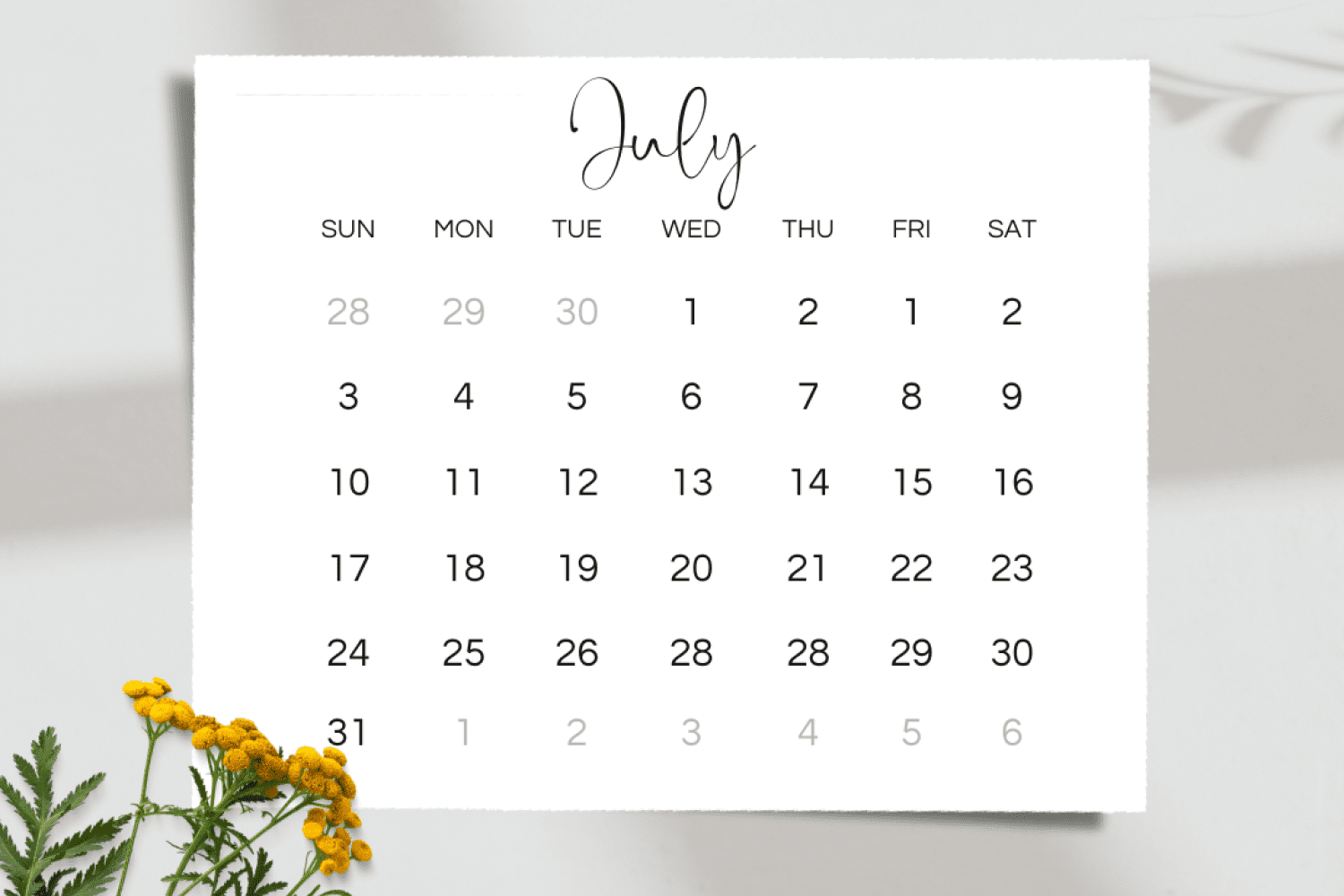Calendar in a minimalist style with a small bouquet of flowers.