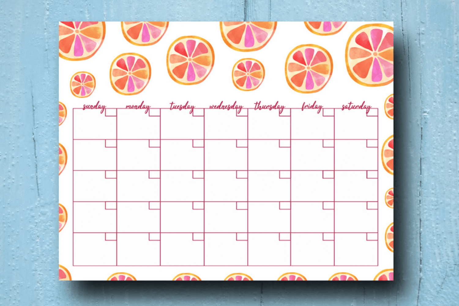 Calendar with drawn colorful grapefruits.