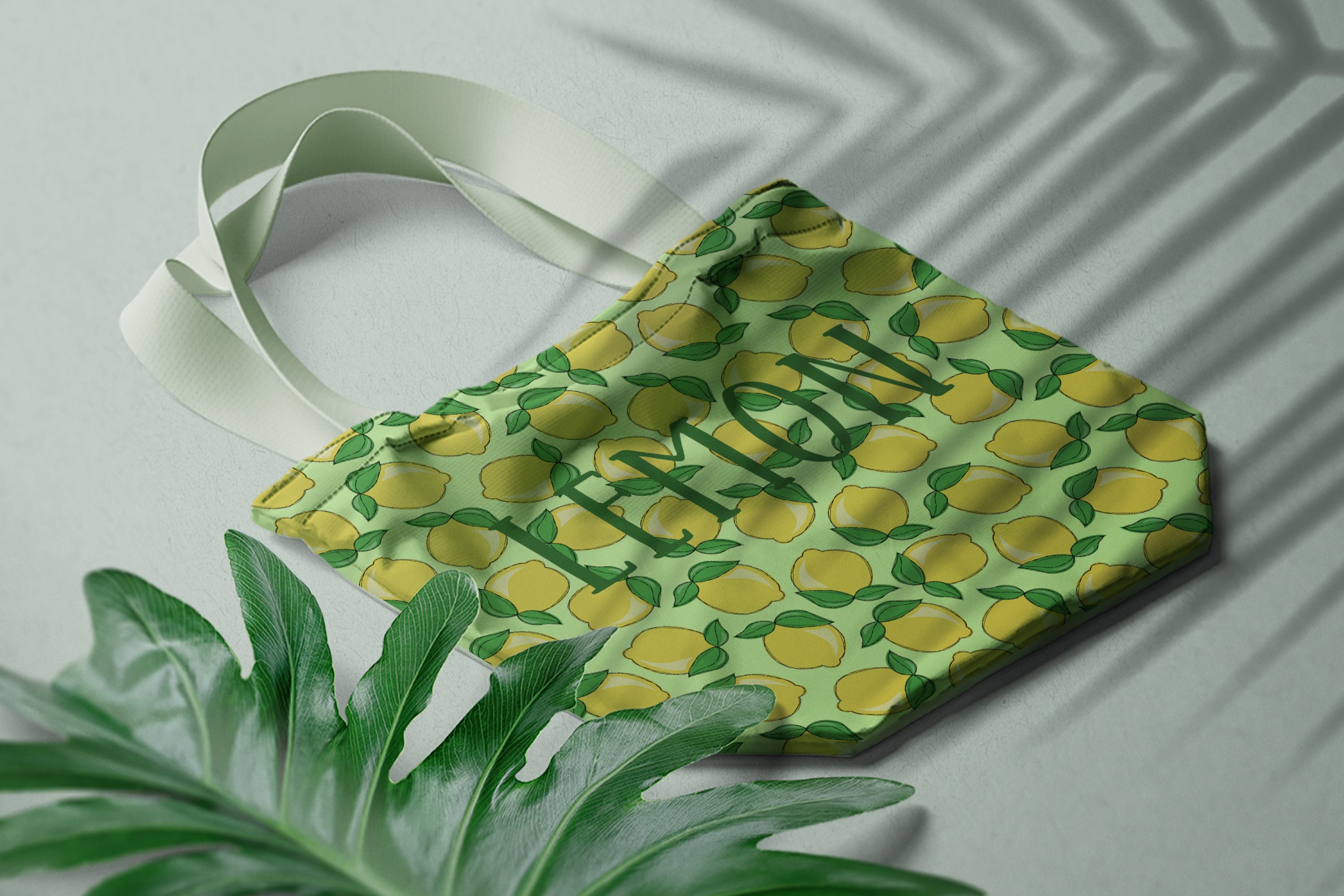 Green eco bag with lemon.